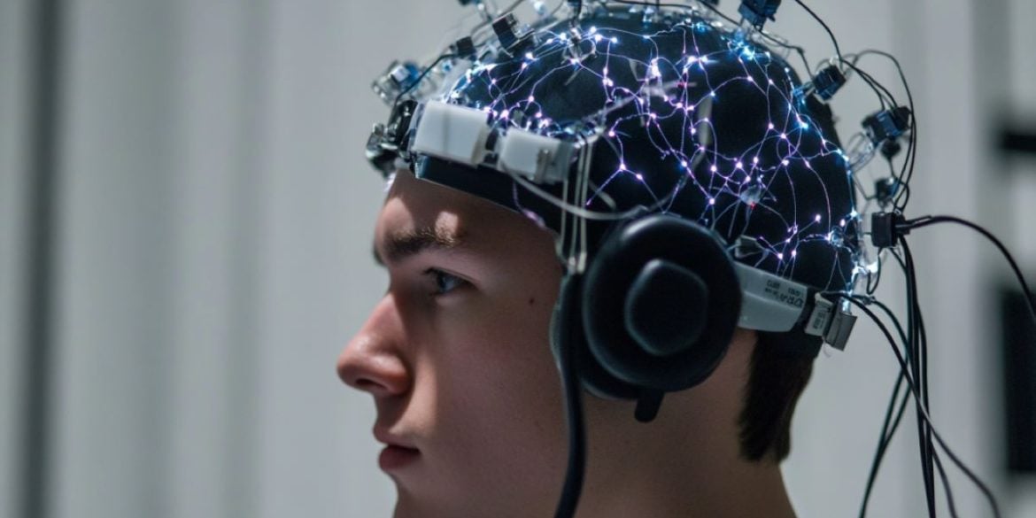 This shows a person in an EEG cap.