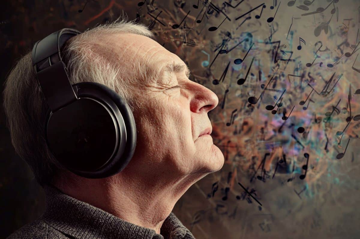 This shows an older man with headphones, surrounded by musical notes.