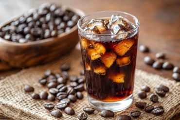 This shows a soda and coffee beans.