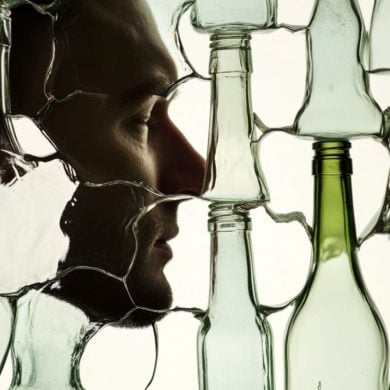 This shows a man's face and broken bottles.