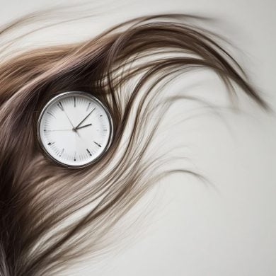 This shows hair and a clock.