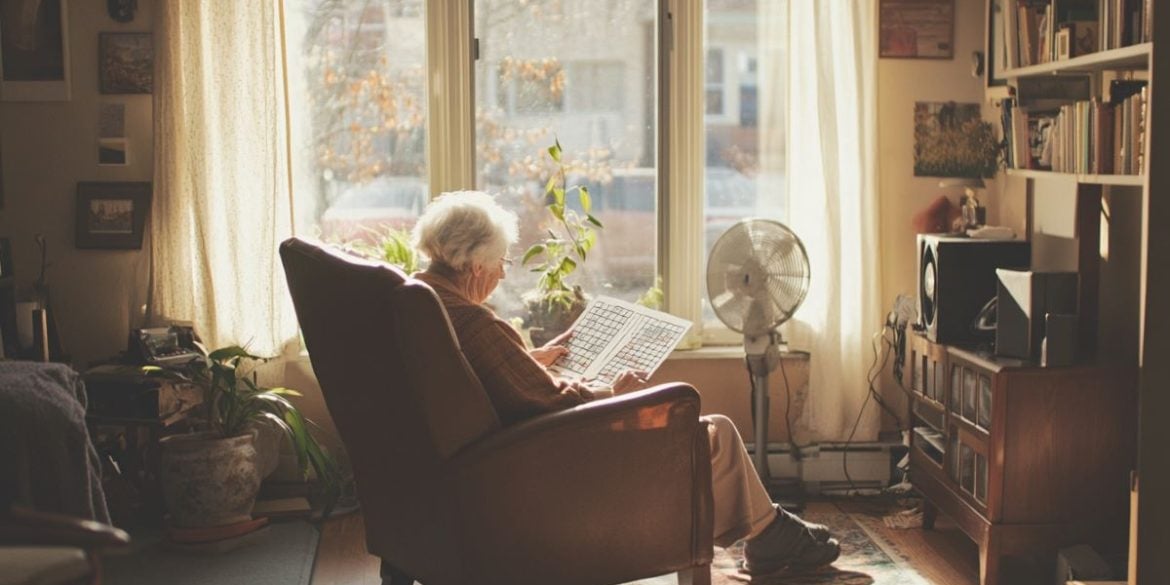 This shows an older woman doing a crossword.