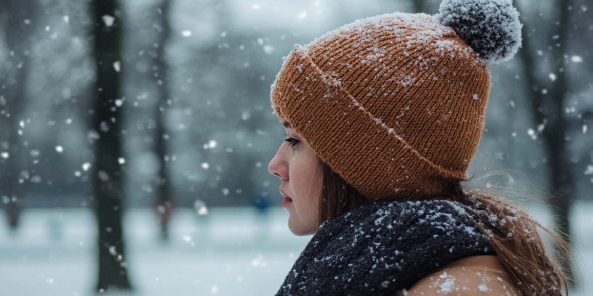This shows a woman in the snow.