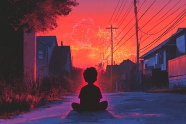 This shows a child sitting in a street.