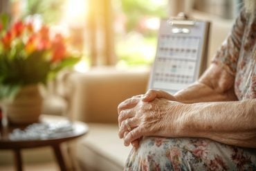 This shows an older woman's hands.