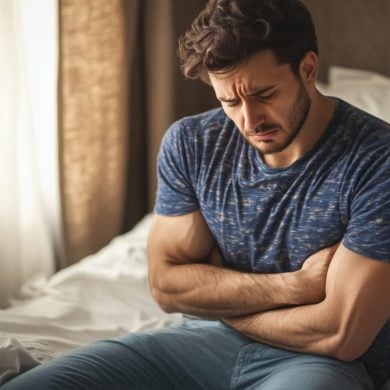 This shows a man holding his stomach.