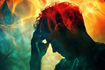 This shows a man holding his head.
