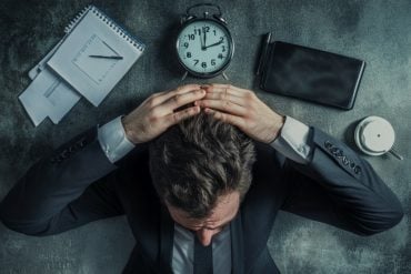 This shows a business man and a clock.