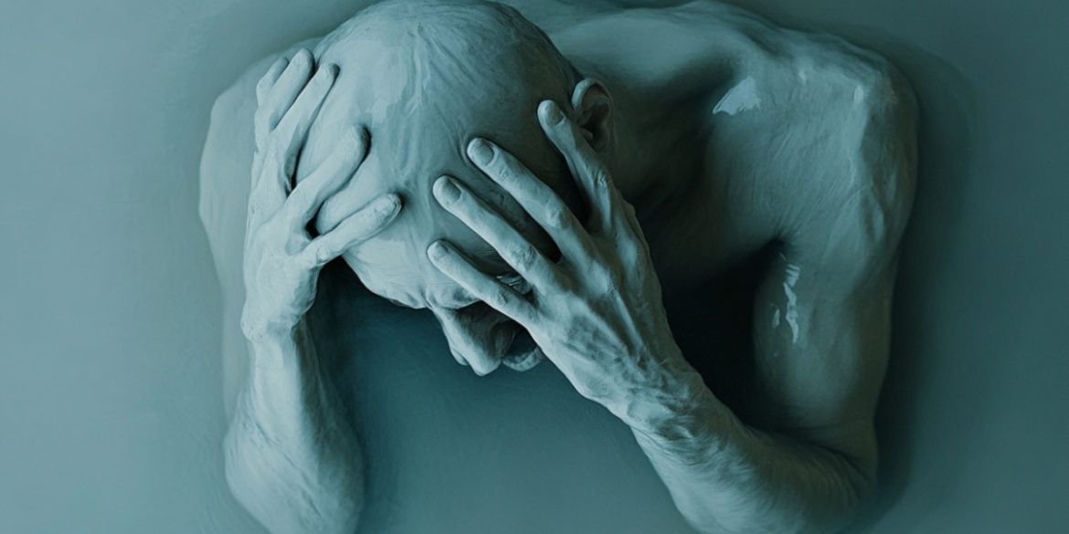 This shows a person holding their head.