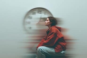 This shows a woman and a clock.