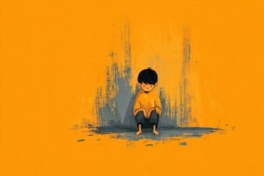 This shows a child sitting alone.