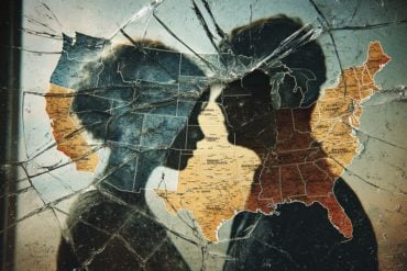 This shows a map of the US and a couple behind shattered glass.