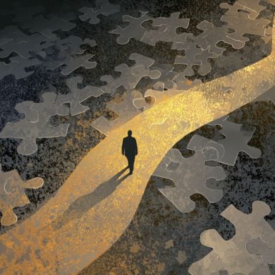This shows a person walking on a path with scattered puzzle pieces at his feet.