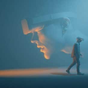 This shows a person walking away from an oversized face.