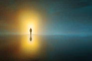 This shows a person walking to a hazy light.