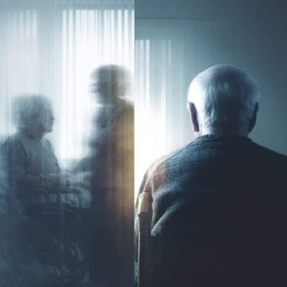 This shows an older man sitting alone.