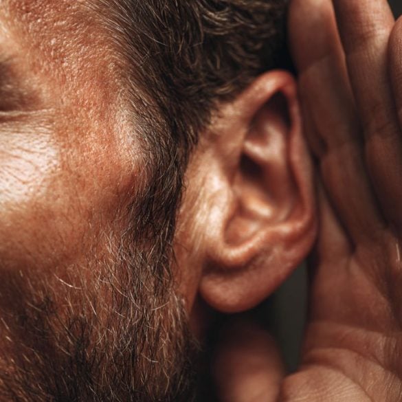 This shows a man cupping his ear.