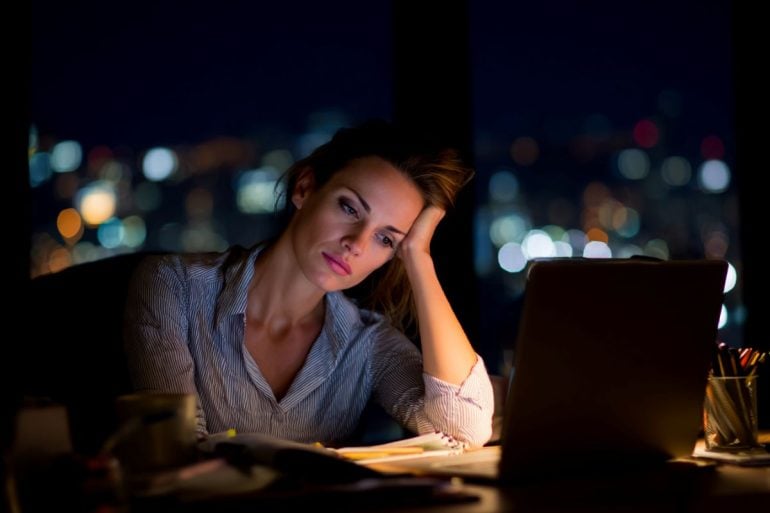 This shows a woman working late at night.