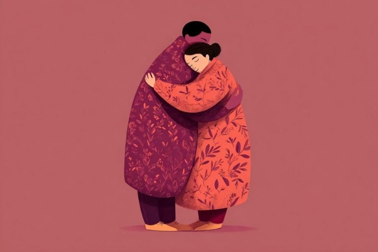This shows two people hugging.