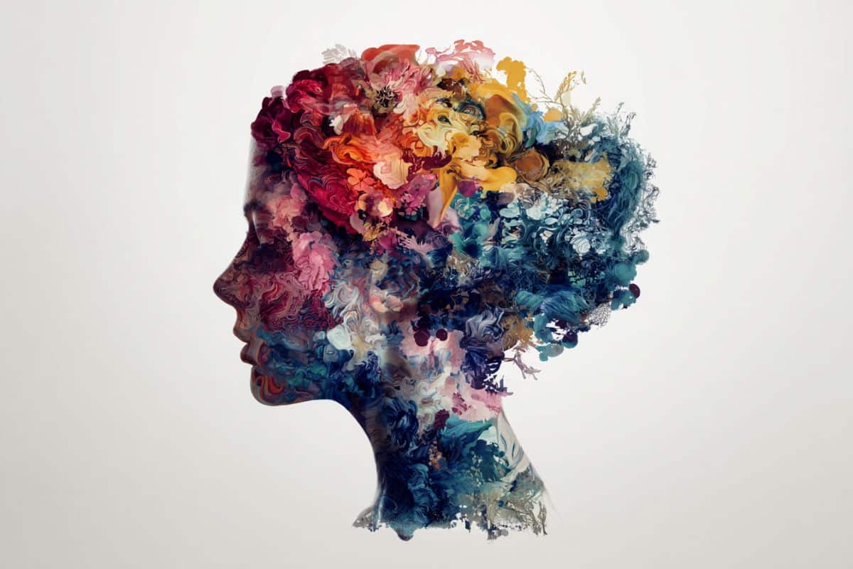 This shows a colorful woman's head with flowers representing emotions.