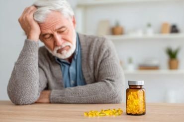 This shows an older man and vitamin D pills.