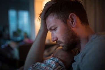 This shows a depressed dad and baby.