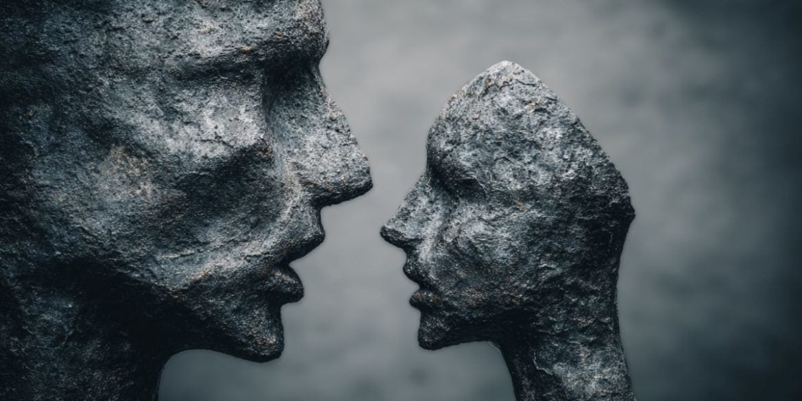 This shows a full statue head and a broken one.