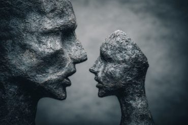 This shows a full statue head and a broken one.