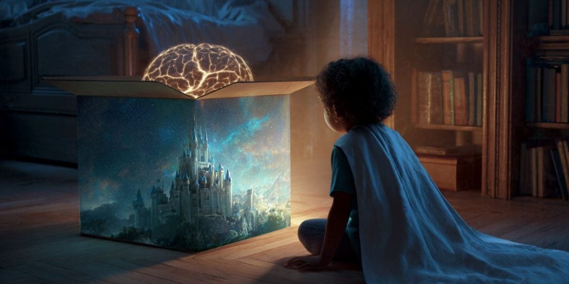 This shows a child in a cape looking at an imaginary castle and a brain.