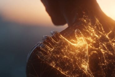 This shows a hand touching a shoulder.