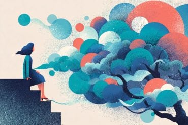 This shows a woman looking at a brain like tree.