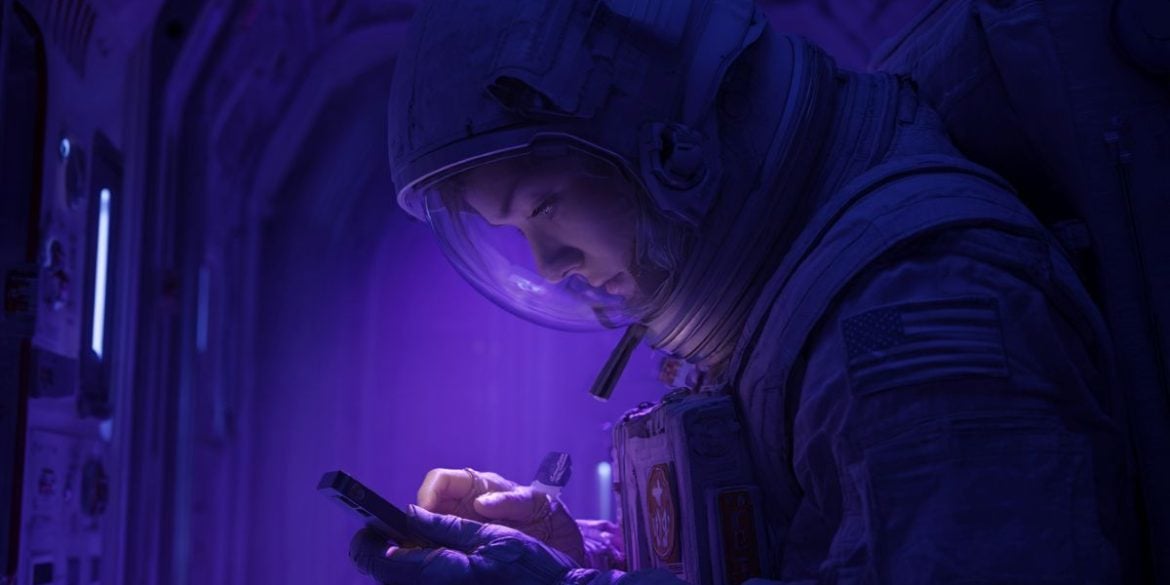 This shows an astronaut performing the test on a phone.