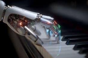 This shows a robotic hand playing a piano.