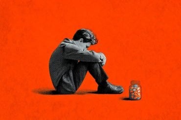 This shows a depressed person and a pill bottle.