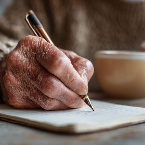 This shows an older person writing.