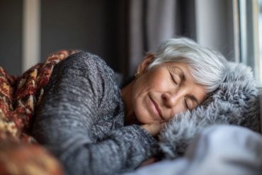 This shows an older woman sleeping.
