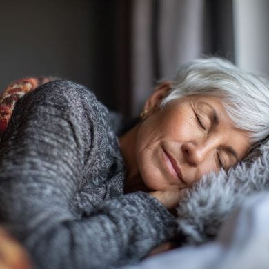 This shows an older woman sleeping.