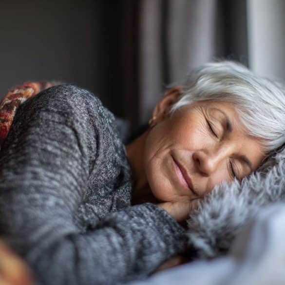 This shows an older woman sleeping.