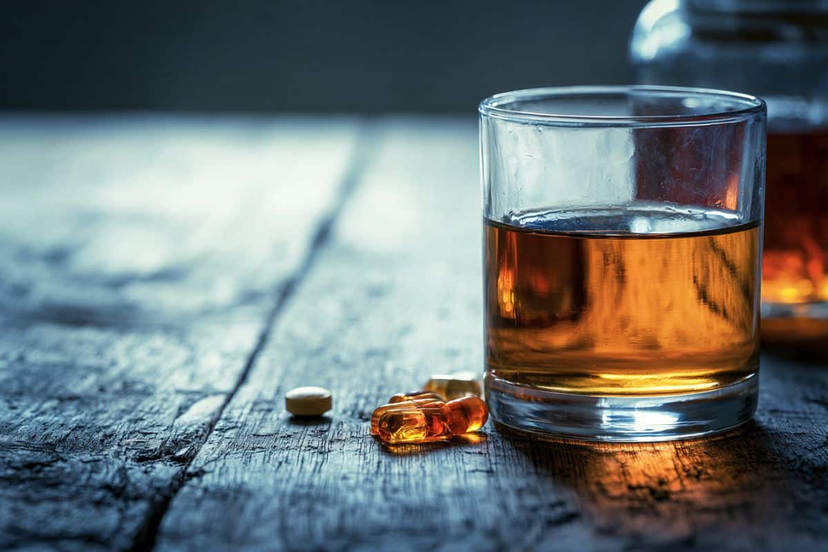 This shows a drink and pills.