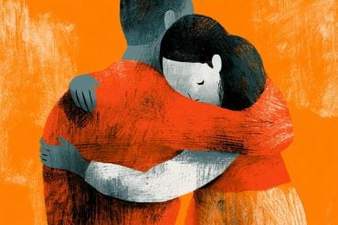 This shows a person holding another upset person, comforting them.