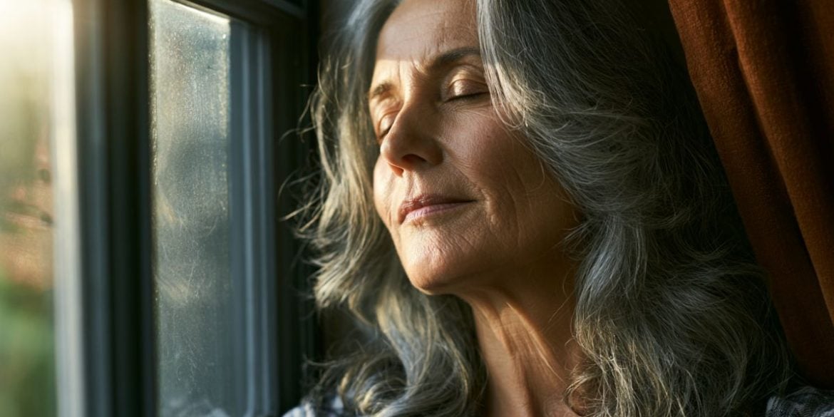 This shows a woman standing at a window.