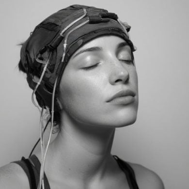 This shows a woman with a headcap on.
