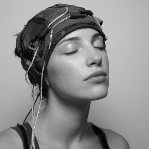 This shows a woman with a headcap on.
