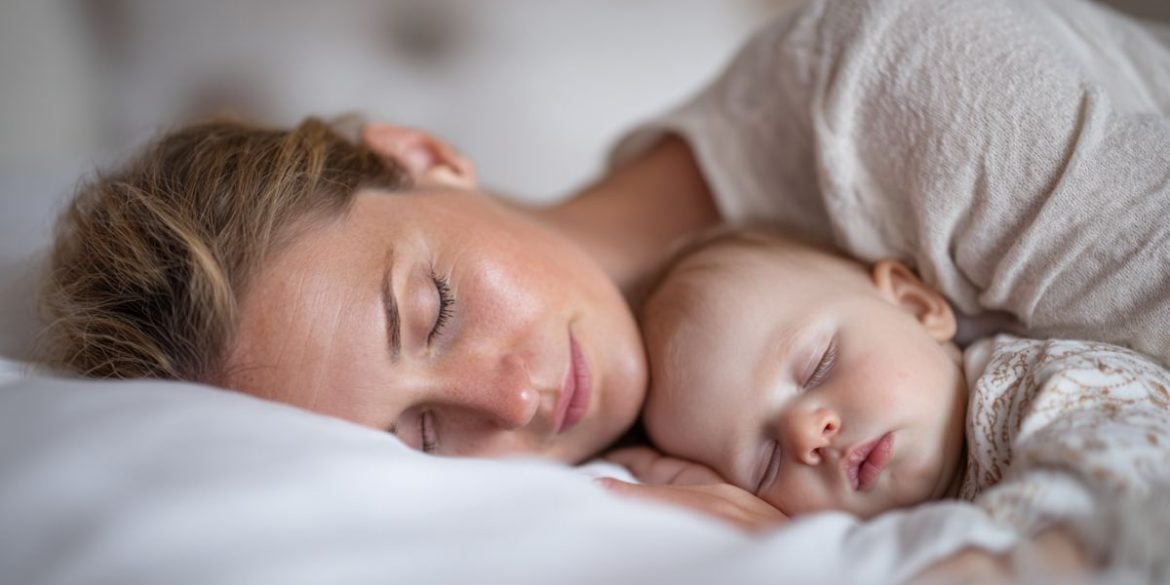 This shows a woman and baby sleeping.