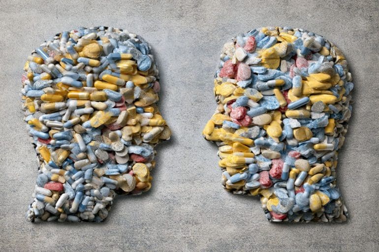This shows two heads made of pills.