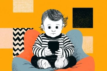 This shows a toddler on a cell phone.