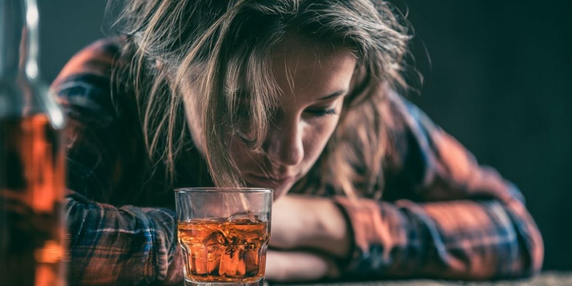 This shows a drink and a sad teen.
