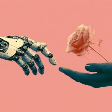 This shows a robot hand and a human hand holding a rose.