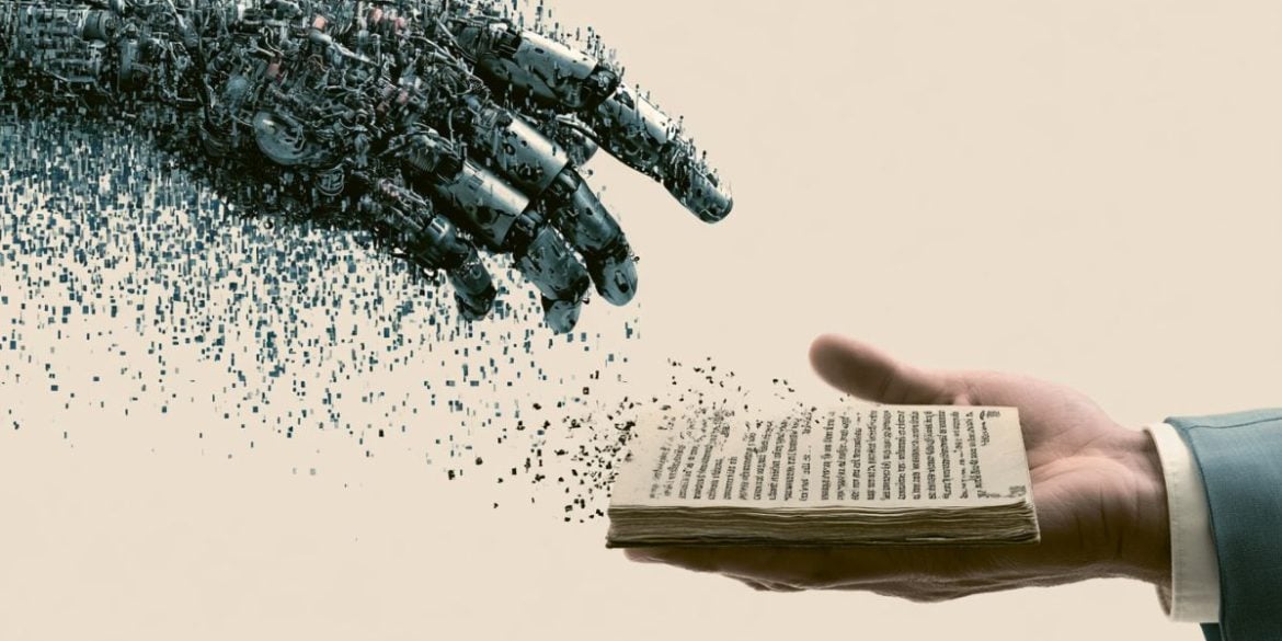 This shows a hand holding a book and a robotic hand.