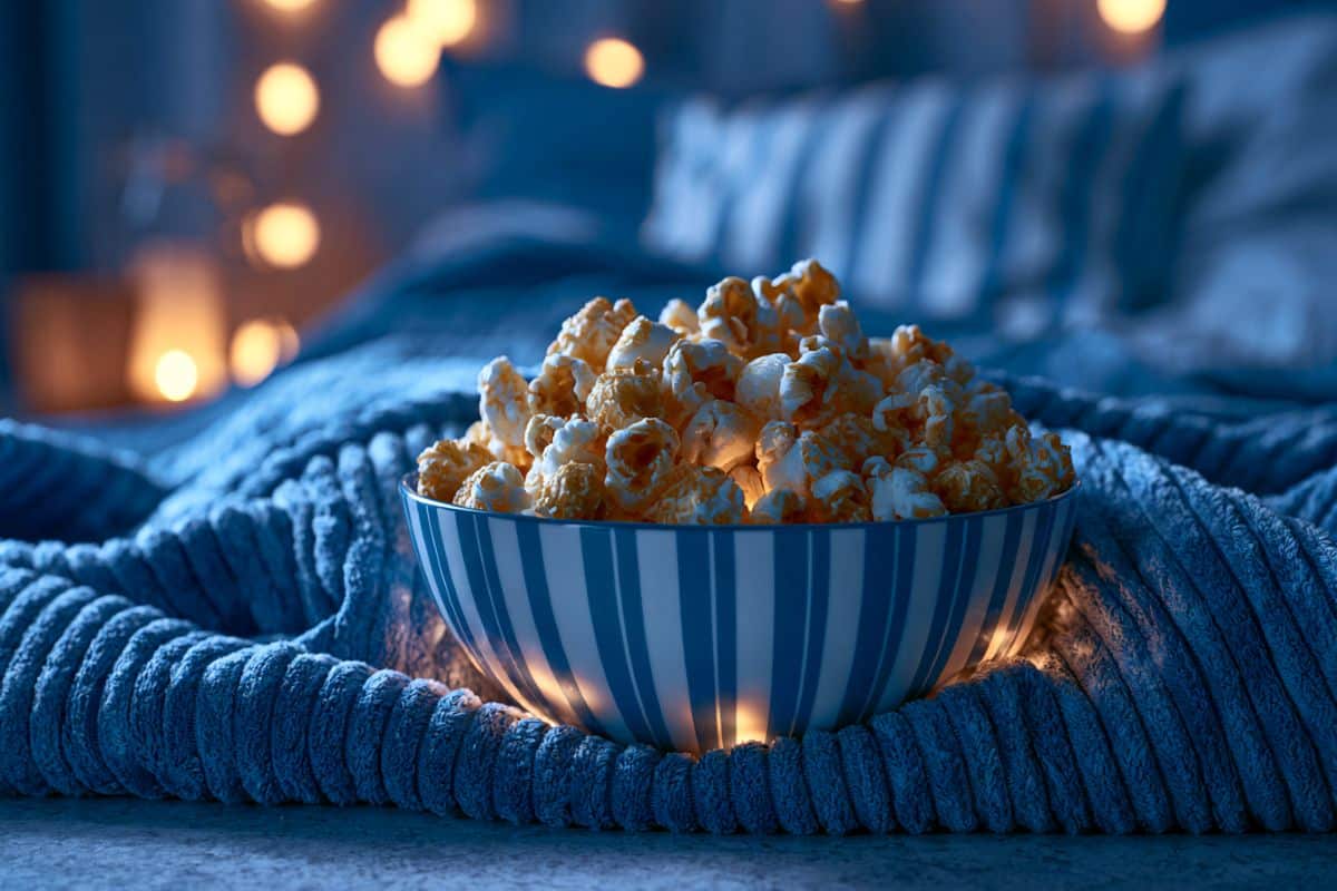 This shows popcorn on a bed.